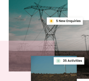 Electricity transmission pylons across open South African veld